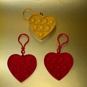 Heart-Shaped Pop It Keychains - 2 Red and 1 Yellow
